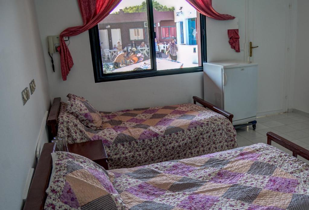 Postel nebo postele na pokoji v ubytování Hôtel Briech & Spa