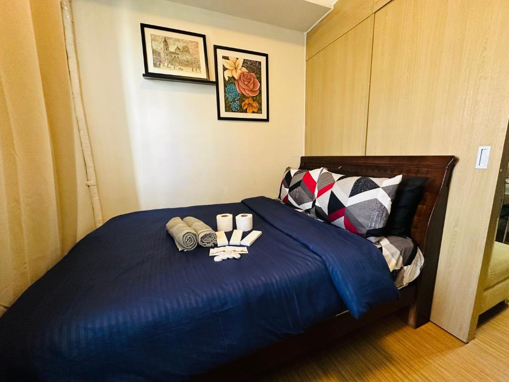 Postel nebo postele na pokoji v ubytování 1bedroom With Balcony Taguig Near Bgc mc kinley