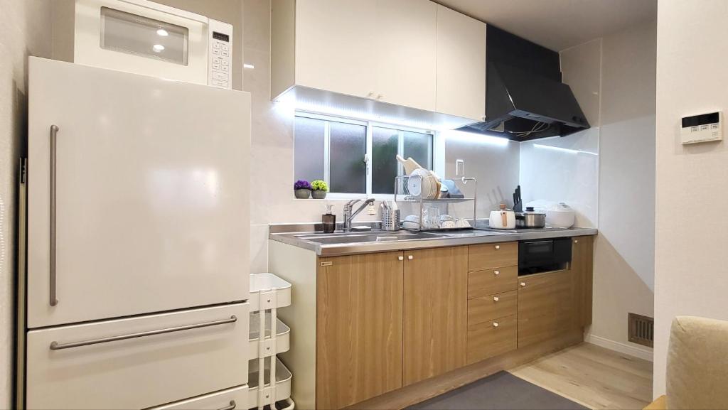 Kuchyň nebo kuchyňský kout v ubytování Hotel STAY ARI Higashishinjuku