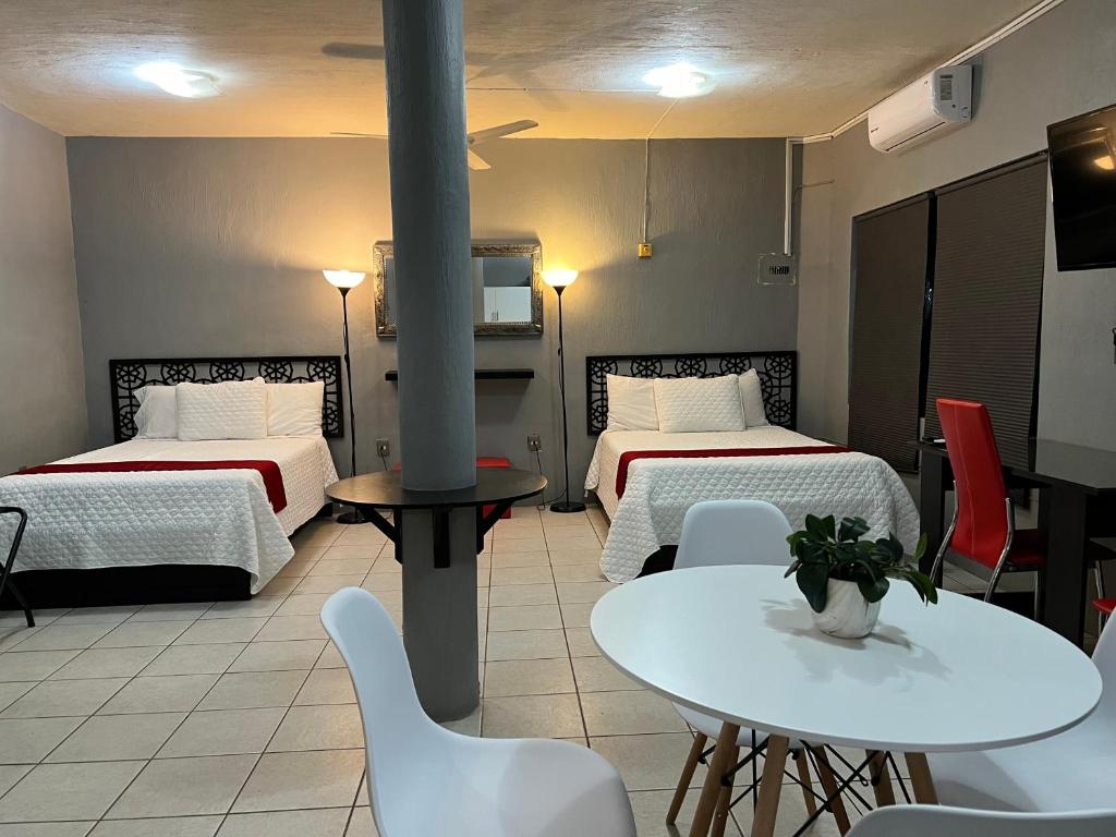 Postel nebo postele na pokoji v ubytování Preciados Loft Cold AC best WIFI