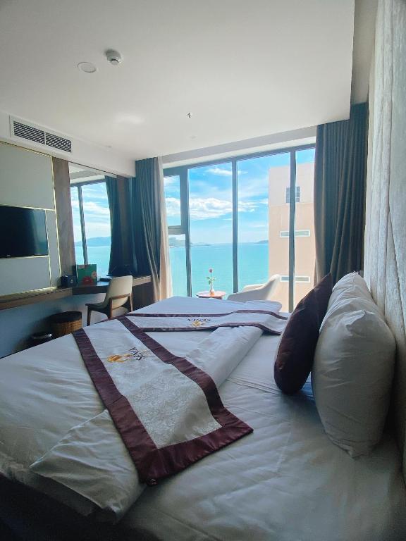 Giường trong phòng chung tại Senia Hotel Nha Trang