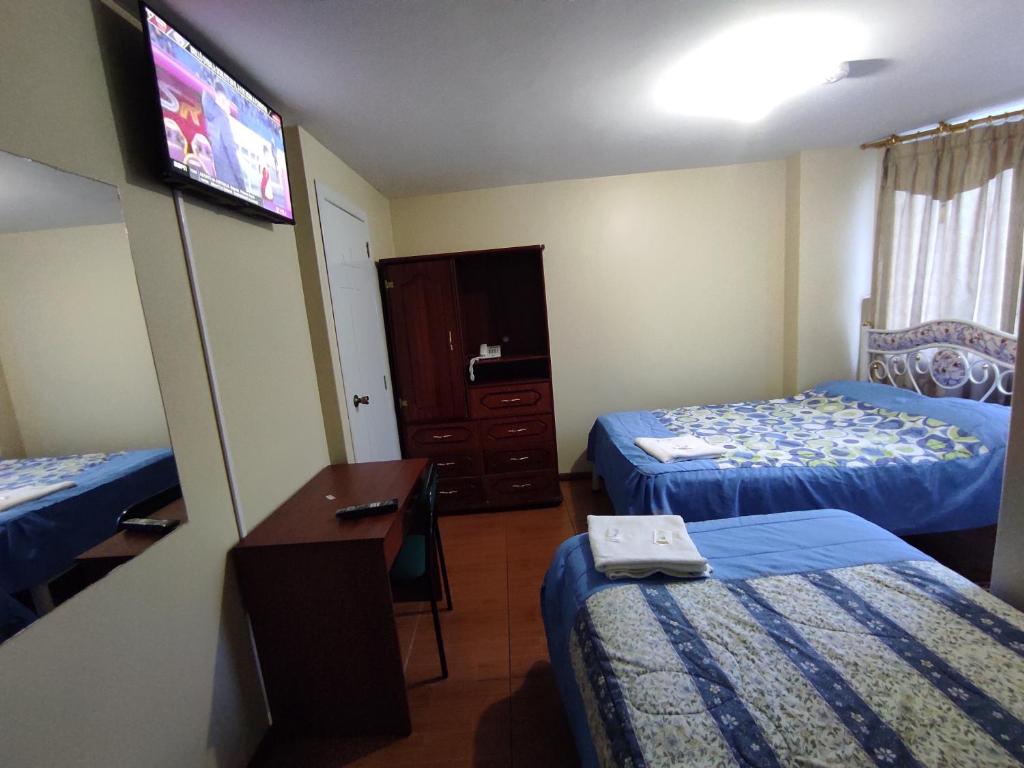 Postel nebo postele na pokoji v ubytování HOTEL CARIBEAN REAL
