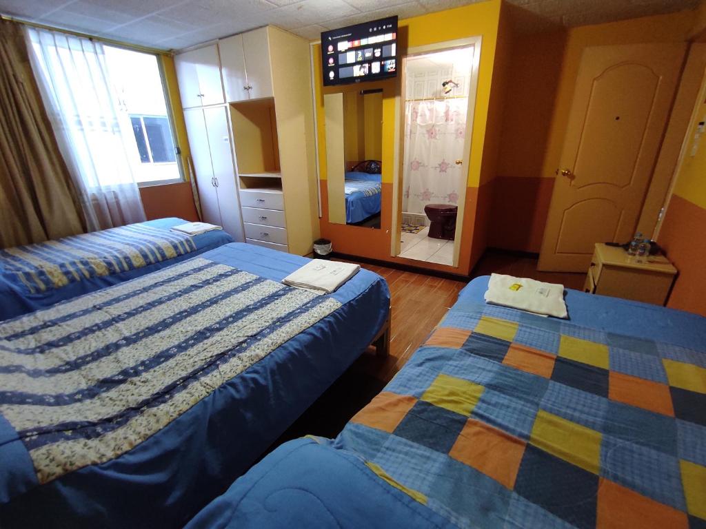 Postel nebo postele na pokoji v ubytování HOTEL CARIBEAN REAL