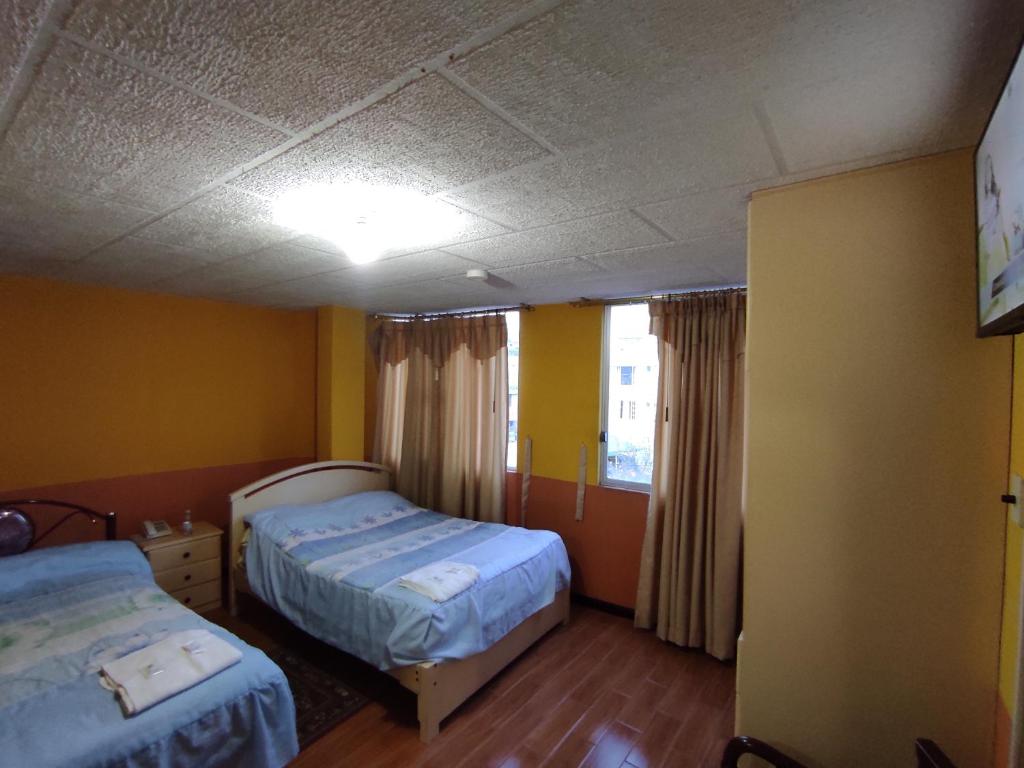 Postel nebo postele na pokoji v ubytování HOTEL CARIBEAN REAL