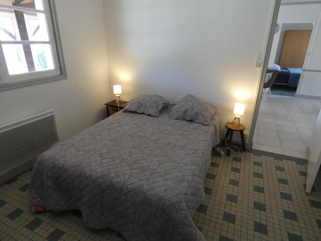 Posteľ alebo postele v izbe v ubytovaní Maison à 700m de la plage, 4 chambres, WIFI, animaux acceptés - Notre-Dame-de-Monts - FR-1-540-175