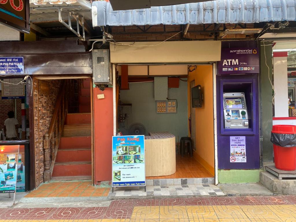 an entrance to a building with a vending machine at Pak Klong Room for rent in Phi Phi Don