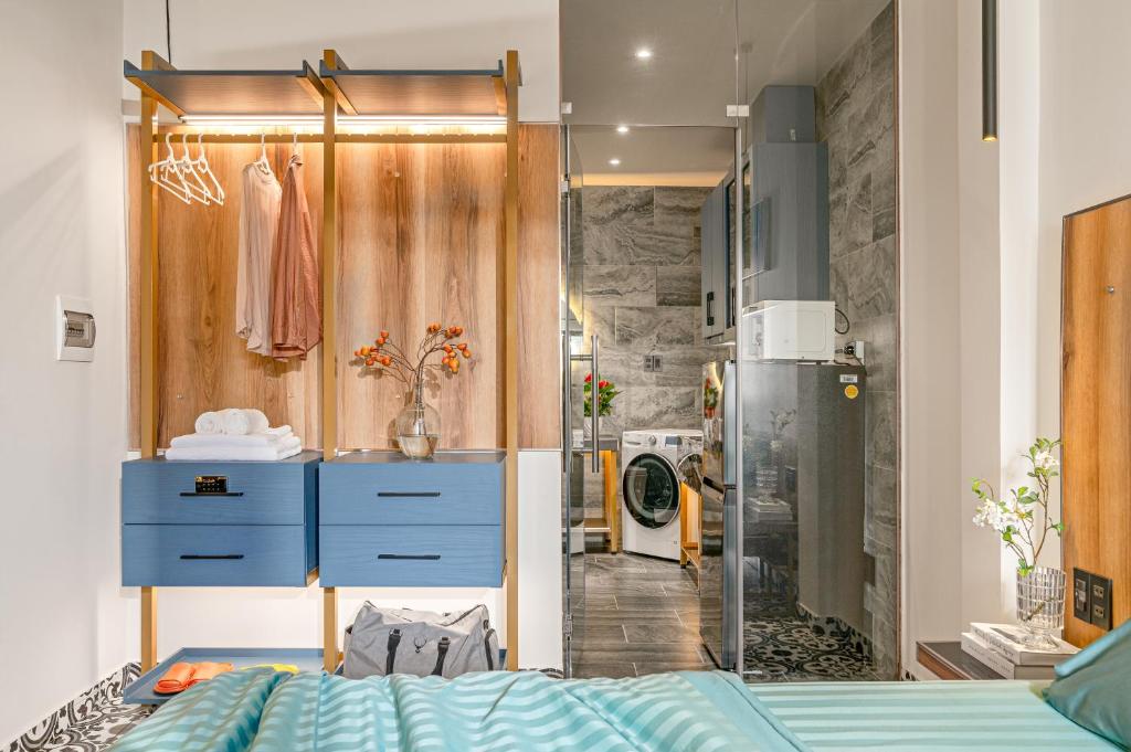 Postel nebo postele na pokoji v ubytování Skycure Serviced Apartments