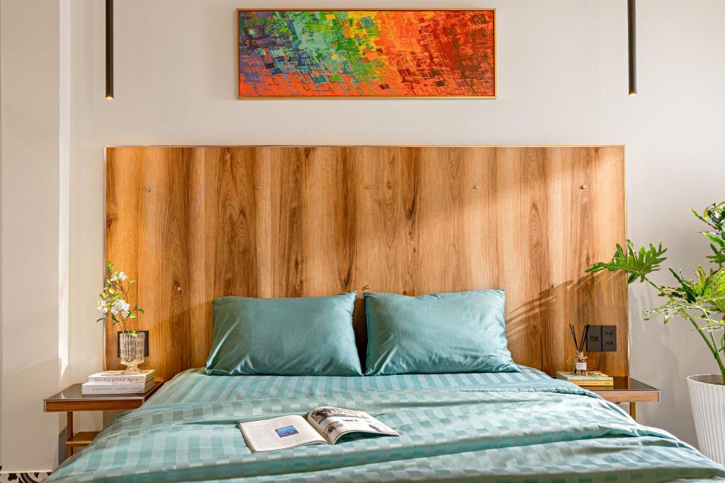 Postel nebo postele na pokoji v ubytování Skycure Serviced Apartments