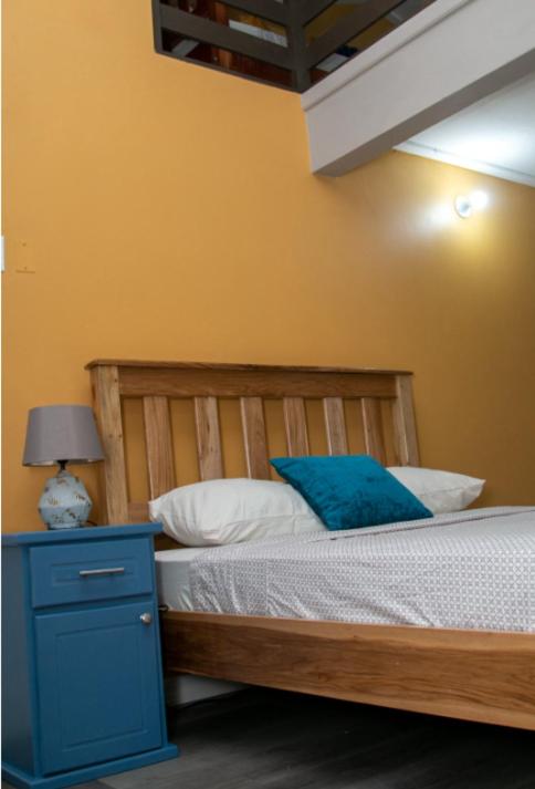 Postel nebo postele na pokoji v ubytování Comfi Spaces