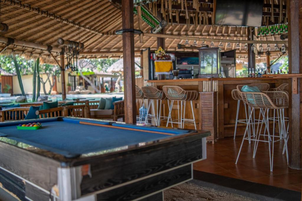 Biliár nebo kulečník v ubytování Taman Sari Bali Resort and Spa