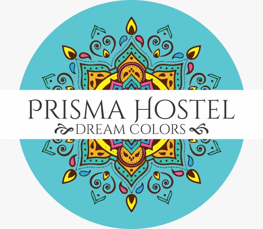 a round label with a pattern in the ethnographic style at Prisma Hostel in Bogotá