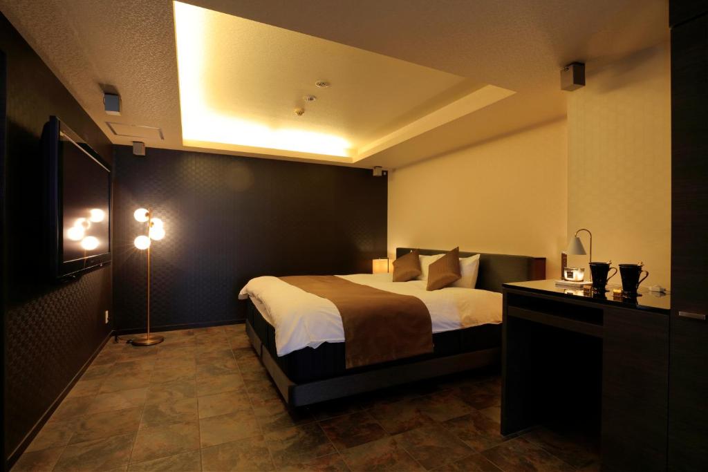 HOTEL felice Osaka -伊丹空港-にあるベッド