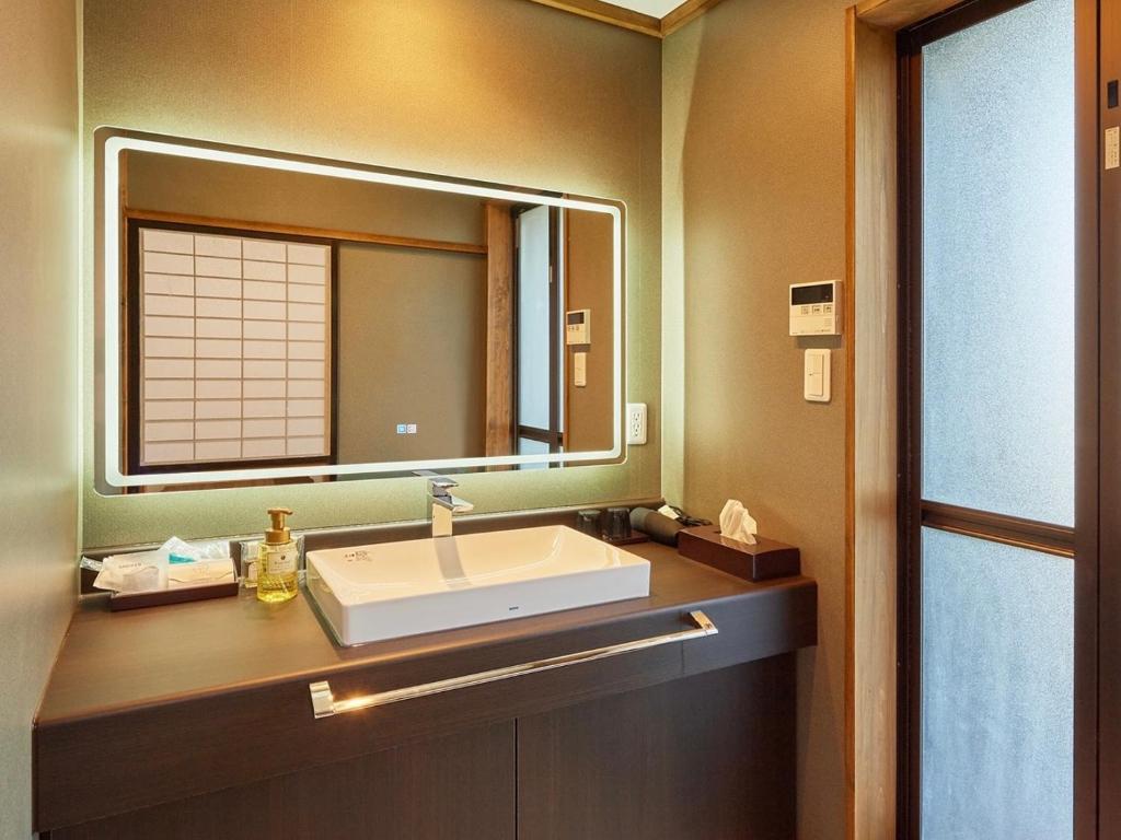 Koupelna v ubytování 吉野荘湯川屋 Yoshinosou Yukawaya