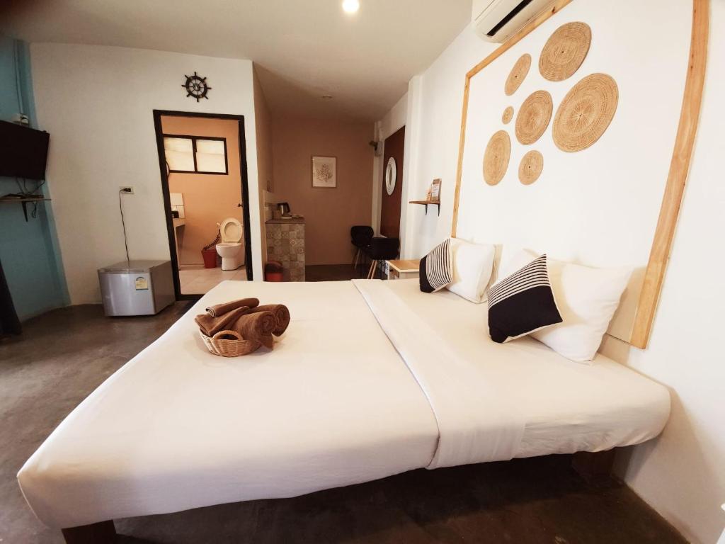 Postel nebo postele na pokoji v ubytování Minnie Seaview Resort