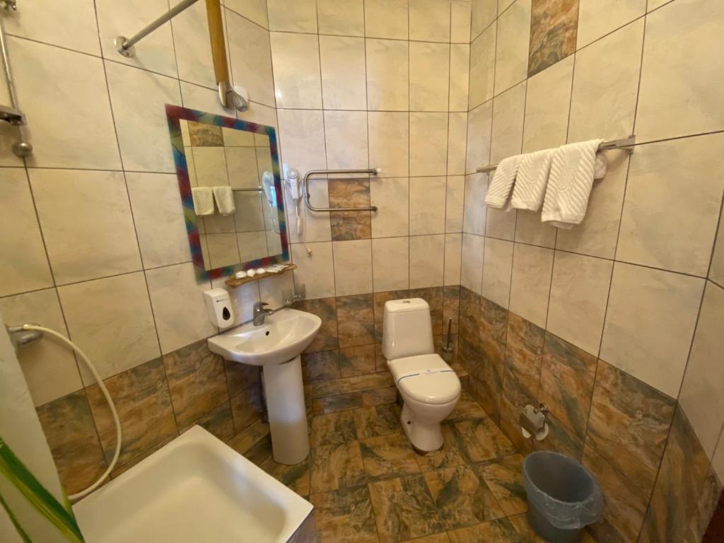 Koupelna v ubytování Tisa Hotel