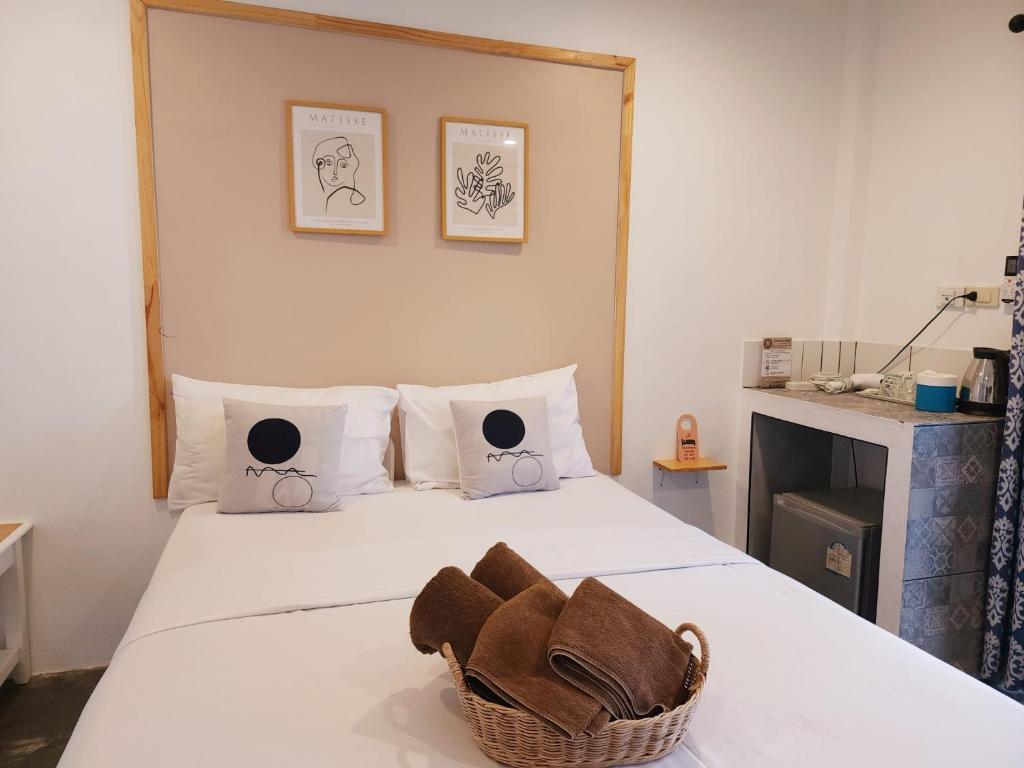 Postel nebo postele na pokoji v ubytování Minnie Seaview Resort
