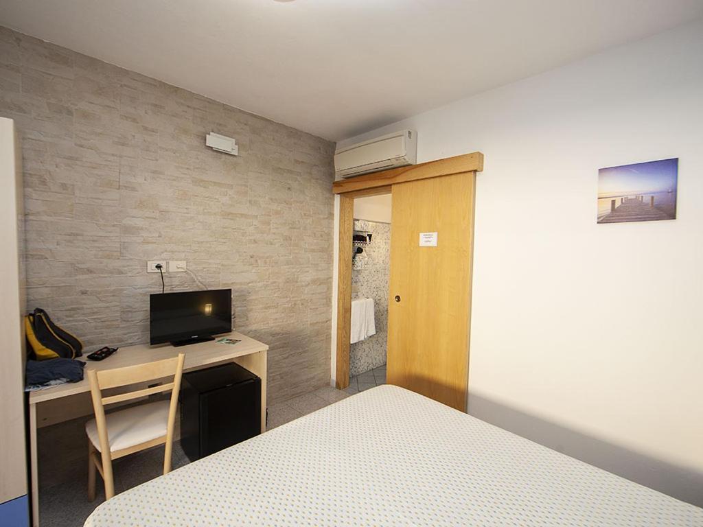 TV a/nebo společenská místnost v ubytování Hotel Aurora