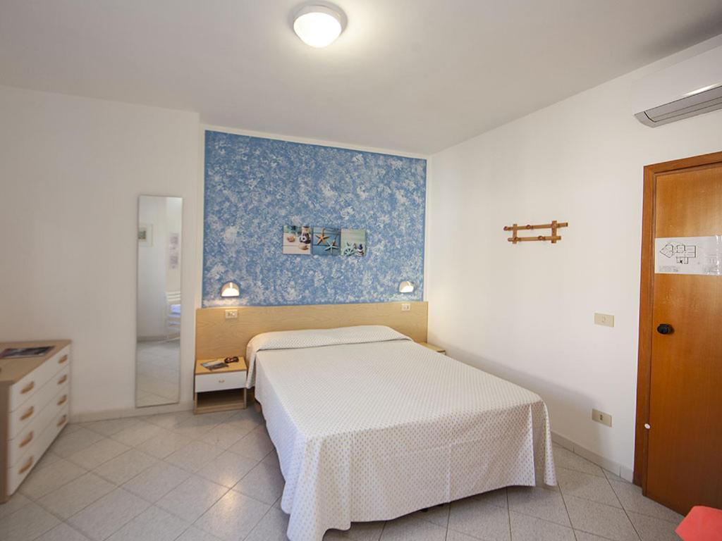 Postel nebo postele na pokoji v ubytování Hotel Aurora