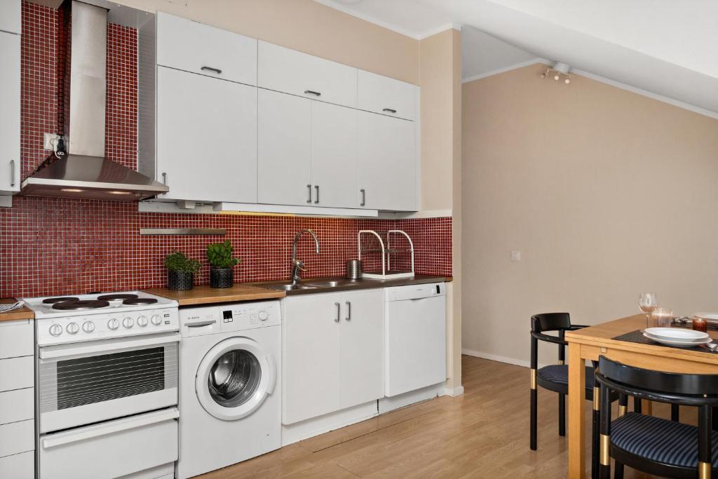 Kuchyň nebo kuchyňský kout v ubytování Stadsparken Apartments