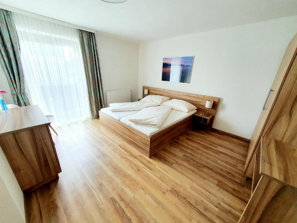 Postel nebo postele na pokoji v ubytování Haus Leitner