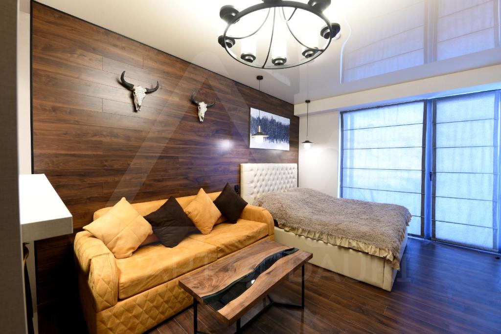 Postel nebo postele na pokoji v ubytování New Gudauri Atrium 211