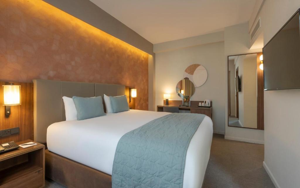 Voodi või voodid majutusasutuse Riu Plaza The Gresham Dublin toas
