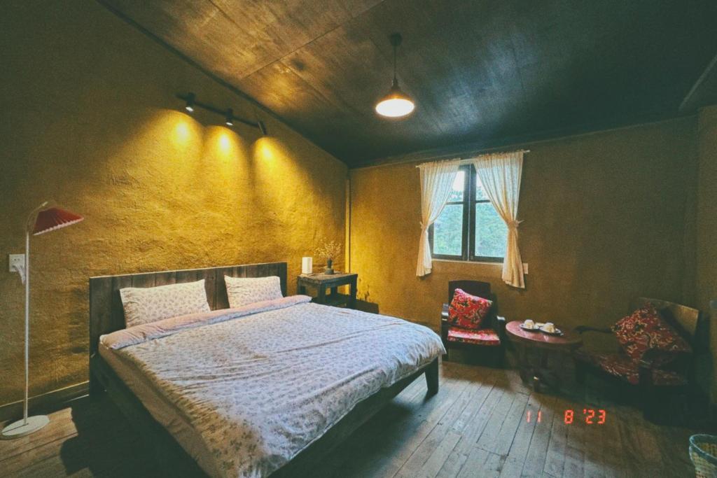 Postel nebo postele na pokoji v ubytování Maison de Hill Home