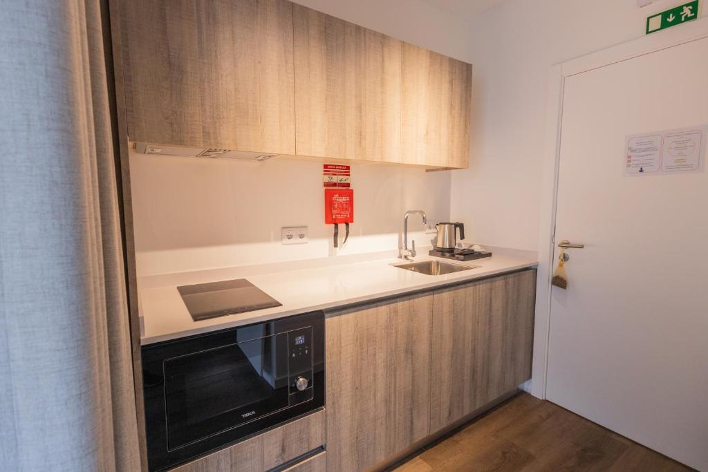 Kuchyň nebo kuchyňský kout v ubytování Watts House