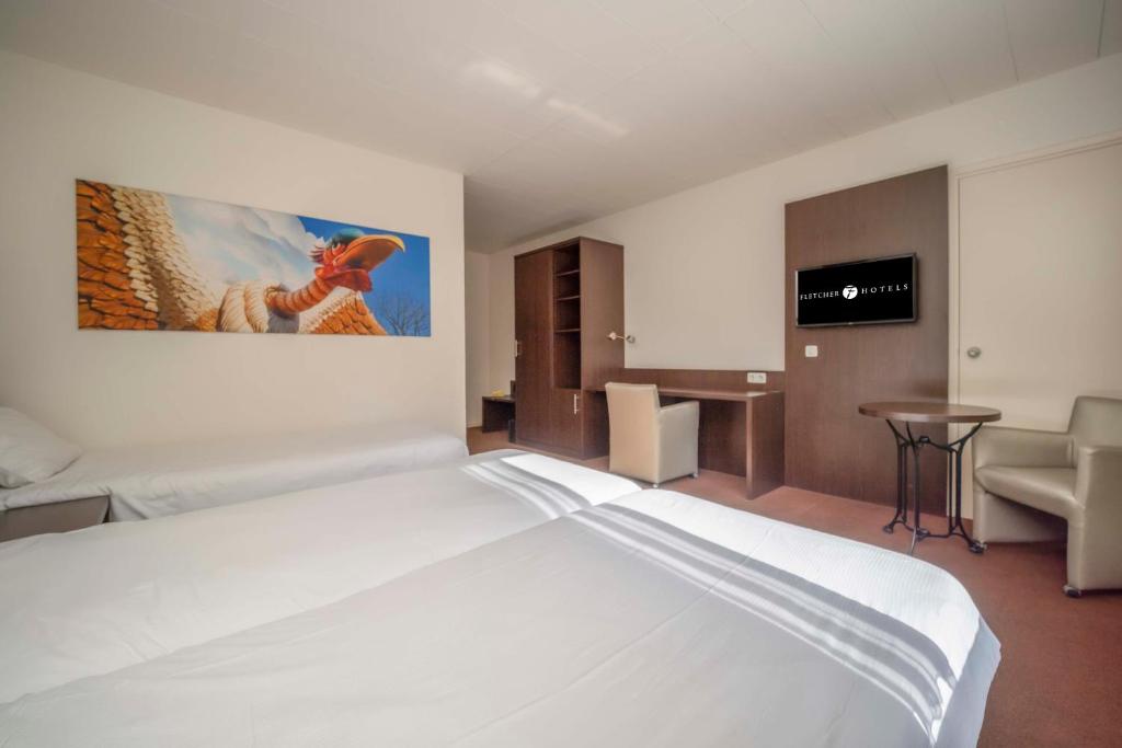 Postel nebo postele na pokoji v ubytování Fletcher Hotel-Restaurant Waalwijk