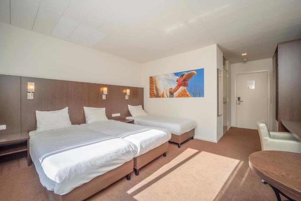 Postel nebo postele na pokoji v ubytování Fletcher Hotel-Restaurant Waalwijk