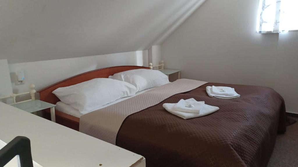 Postel nebo postele na pokoji v ubytování Apartmány Orlová