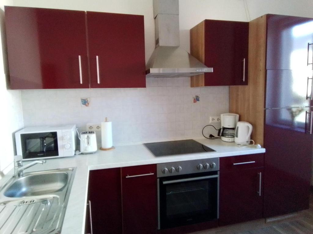 Kuchyň nebo kuchyňský kout v ubytování Weingut-Ferienwohnung Heinz Dostert
