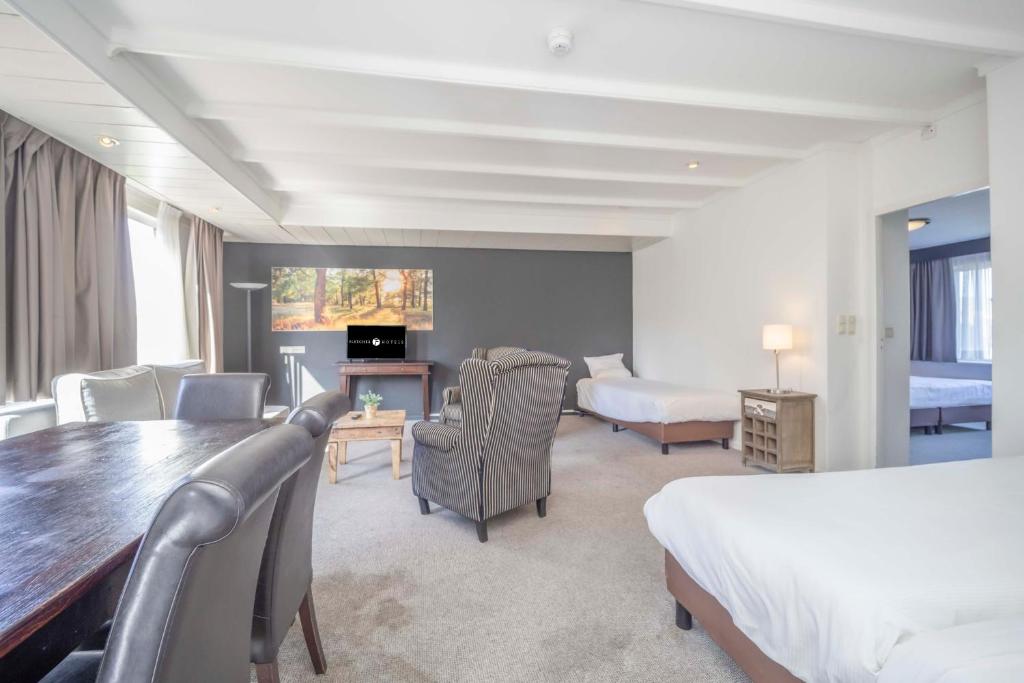 Postel nebo postele na pokoji v ubytování Fletcher Hotel-Restaurant Waalwijk