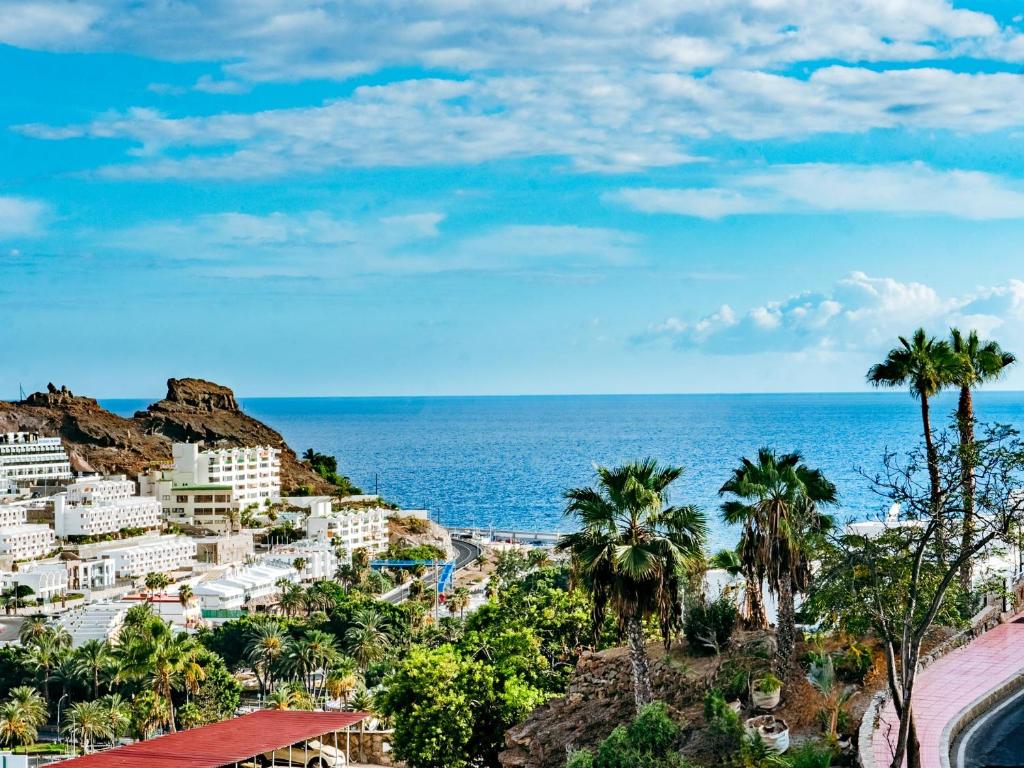 a view of the beach and the ocean at Canaima Sea View/Terrace/Pool in Mogán