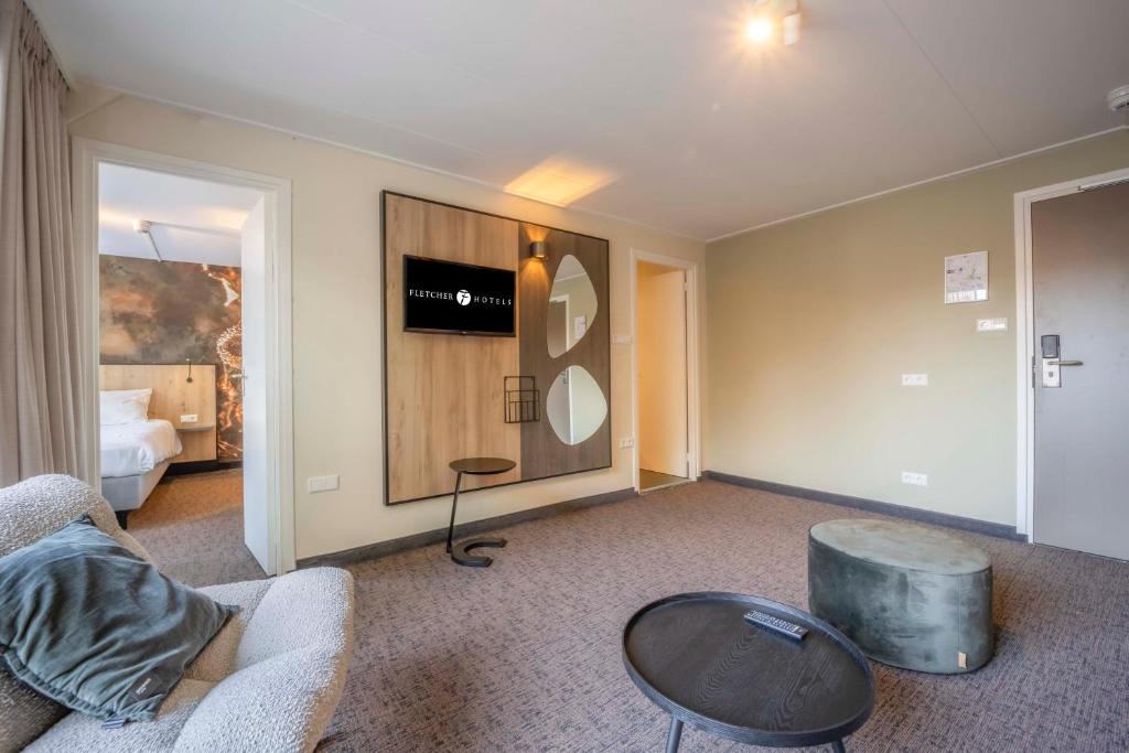 TV a/nebo společenská místnost v ubytování Fletcher Hotel-Restaurant Waalwijk