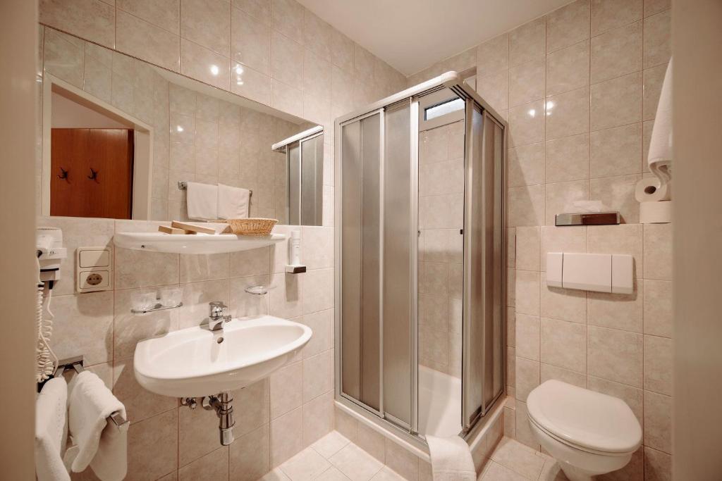 Koupelna v ubytování Hotel Lisa