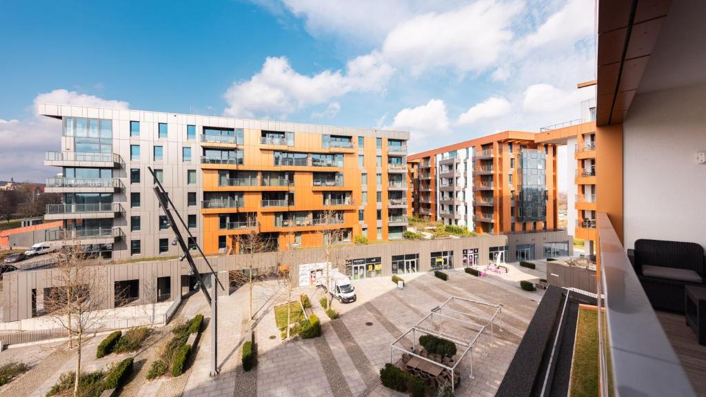 a view from the balcony of an apartment building at Flatbook - City Center Apartments Brabank with Parking in Gdańsk