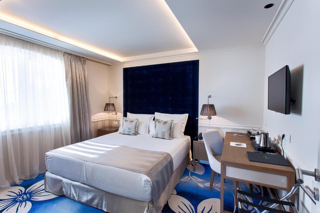 Posteľ alebo postele v izbe v ubytovaní Grand Hotel Slavia - Adults only