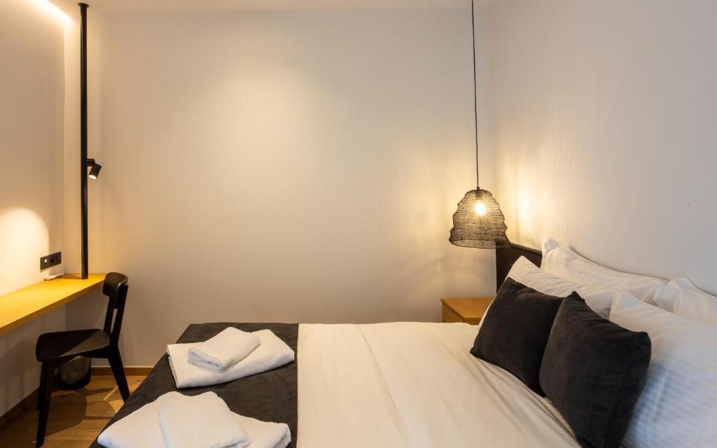 Postel nebo postele na pokoji v ubytování Nostos - Luxury Apartment in Agrinio