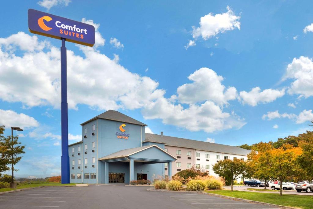 a building with a sign for a comfort suites at Comfort Suites in Bloomsburg