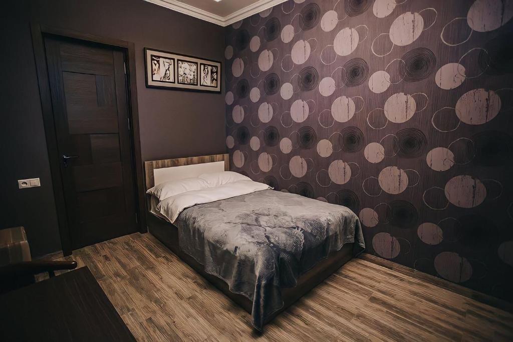 Postel nebo postele na pokoji v ubytování 7 Rooms Hotel