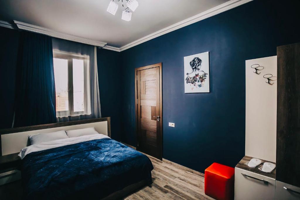 Postel nebo postele na pokoji v ubytování 7 Rooms Hotel