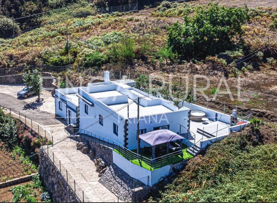 an aerial view of a house on a hill at Finca Rural Triana in Santa Cruz de Tenerife