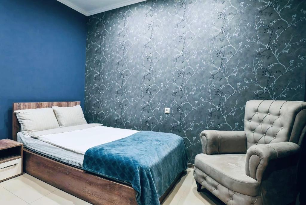 Postel nebo postele na pokoji v ubytování 7 Rooms Hotel