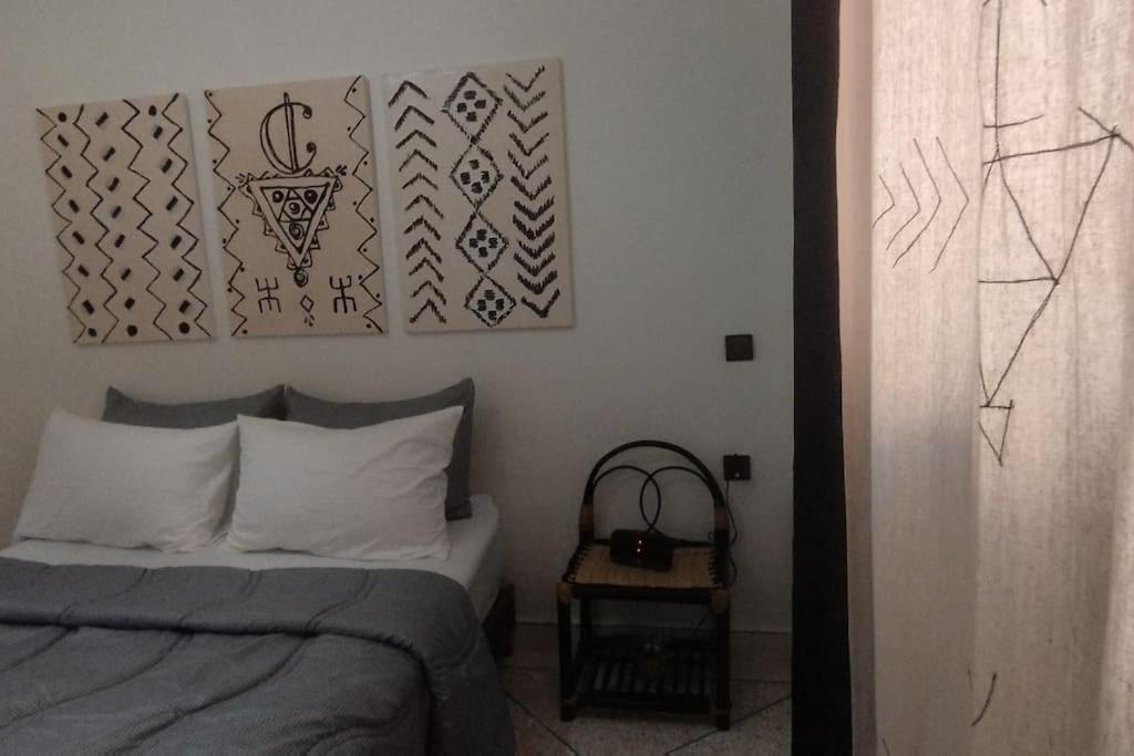 Postel nebo postele na pokoji v ubytování Tambarkiyt House Studio Appartement - Aourir Agadir