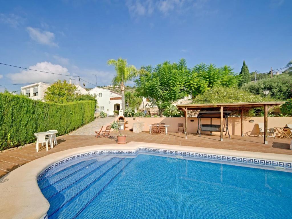 uma piscina num quintal com uma casa em Holiday Home Germaine by Interhome em Xàbia
