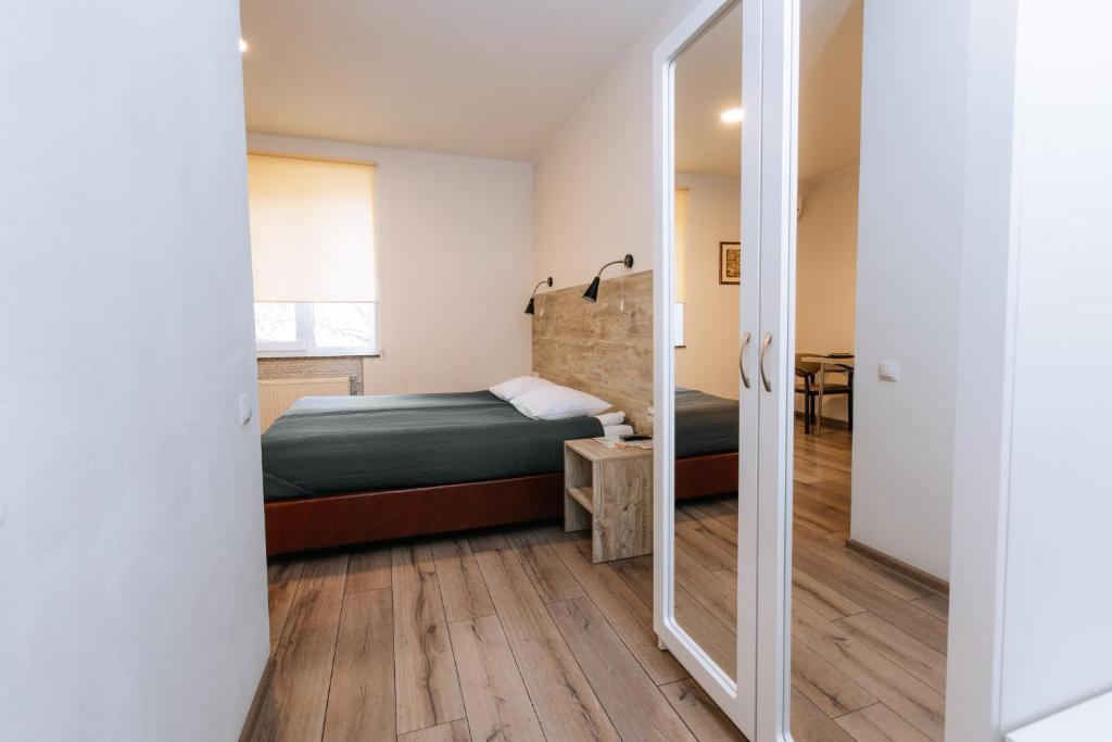 Postel nebo postele na pokoji v ubytování Smart Apart