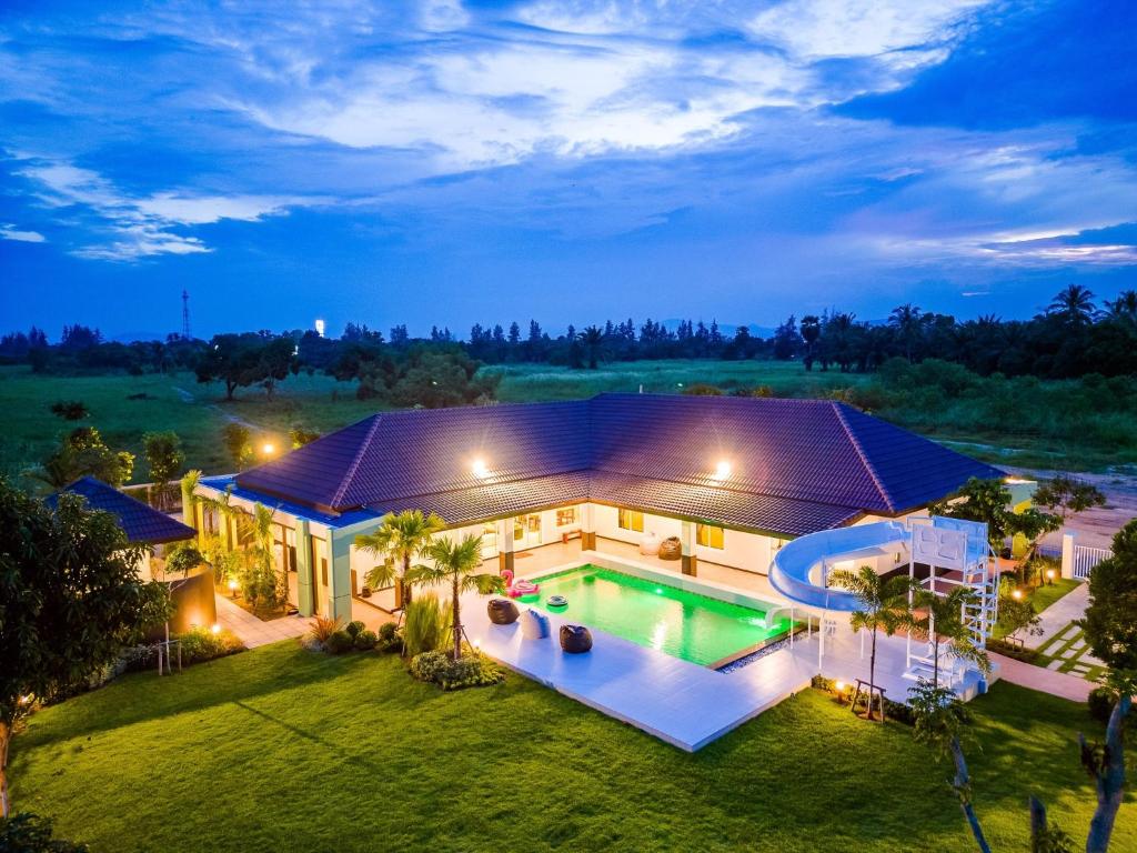 an aerial view of a house with a swimming pool at Prime Villa Hua Hin in Ban Thap Tai (1)