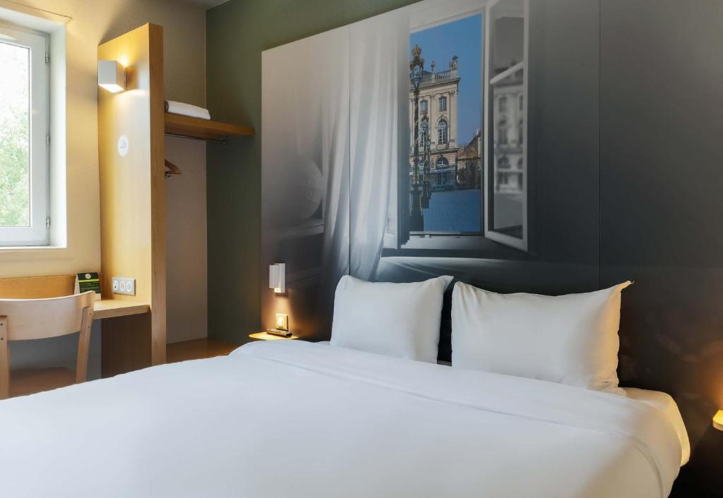Postel nebo postele na pokoji v ubytování B&B HOTEL Nancy Laxou Zenith