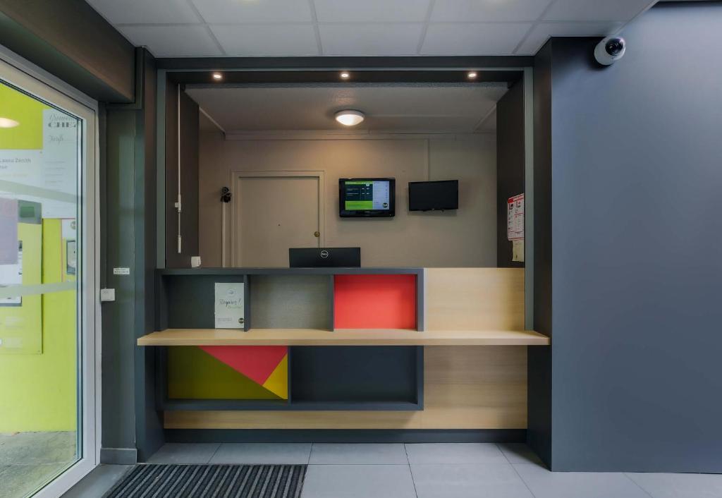 TV a/nebo společenská místnost v ubytování B&B HOTEL Nancy Laxou Zenith